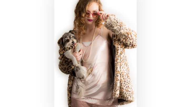 Fashion model with small dog